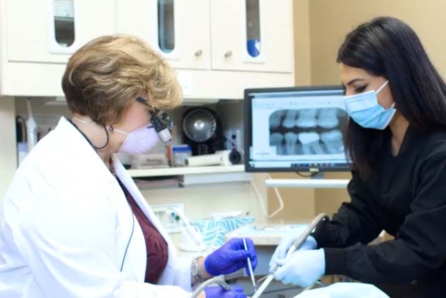 emergency exam dr rice looks at patient's mouth