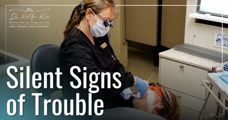 dental hygienist with patient